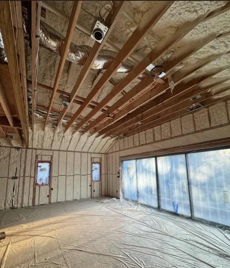 Interior walls and ceiling insulated with spray foam during new construction in Ormond Beach